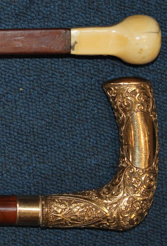A 19th ivory handled square section walking cane & another